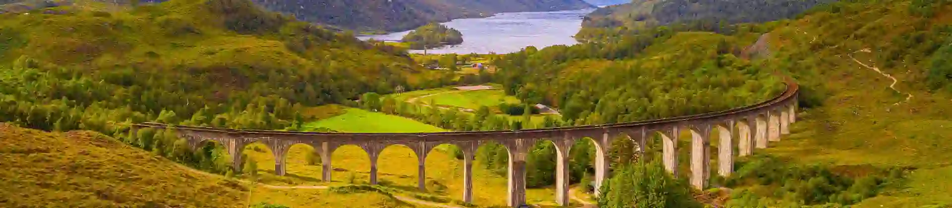 View of Glenfinnan Viaduct and its surrounding mountains