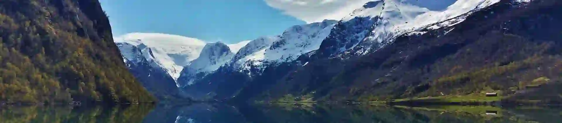 Fjord in Norway with snow in the mountain